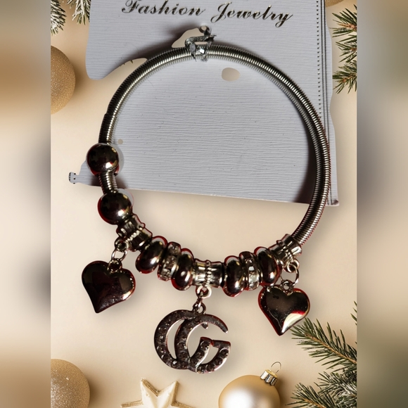 Fashion Inspired Rhinestone and Silvertone Bangle Charm Bracelet NEW IN PACKAGE - Picture 1 of 3